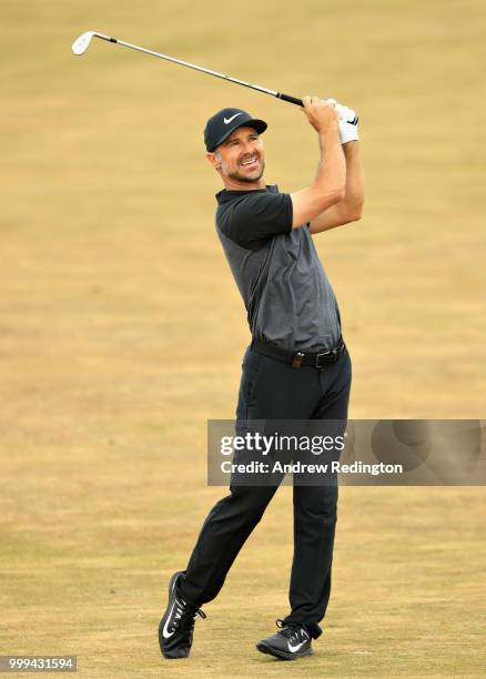 Trevor Immelman of South Africa takes his second shot on hole four during day four of the Aberdeen Standard Investments Scottish Open at Gullane Golf...