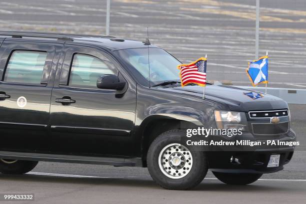 Presidential car flies the Saltire alongside the US flag as it waits for the arrival of US President Donald Trump and his wife, Melania, at Prestwick...