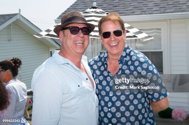 Salvatore Piazzolla and Grant Wilfley attend the Modern Luxury + The Next Wave at Breakers Montauk on July 14, 2018 in Montauk, New York.