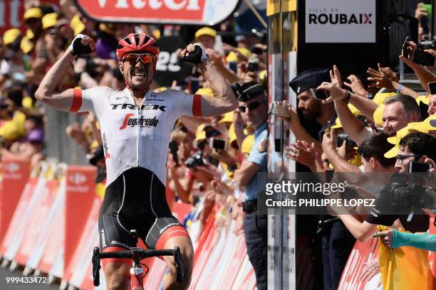 Germany's John Degenkolb celebrates as he crosses the finish line to win the ninth stage of the 105th edition of the Tour de France cycling race...