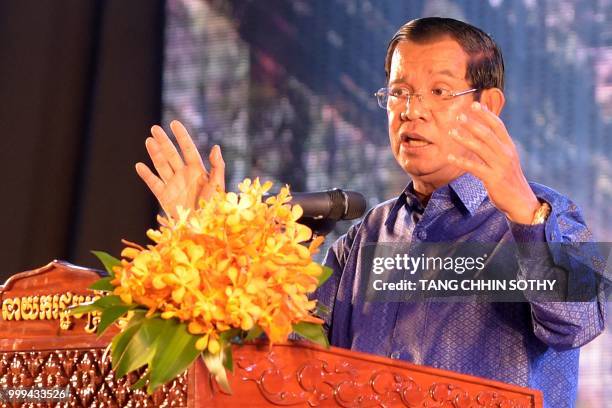 Cambodian Prime Minister Hun Sen speaks during a ceremony at the Olympic national stadium in Phnom Penh on July 15, 2018. - The Cambodian government...