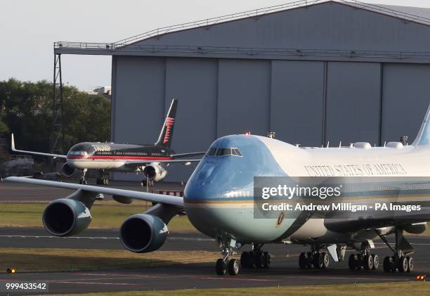 Air Force One arrives at Prestwick airport in Ayrshire, alongside US President Donald Trump's personal plane, as President Trump and his wife,...