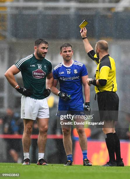 Dublin , Ireland - 15 July 2018; Referee Anthony Nolan shows both Fergal Conway of Kildare and Dessie Mone of Monaghan a yellow card during the GAA...