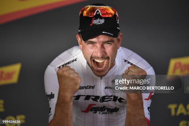 Germany's John Degenkolb celebrates on the podium after winning the ninth stage of the 105th edition of the Tour de France cycling race between Arras...