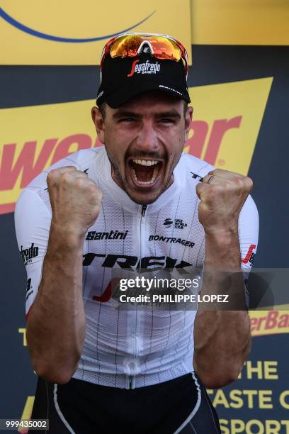 Germany's John Degenkolb celebrates on the podium after winning the ninth stage of the 105th edition of the Tour de France cycling race between Arras...