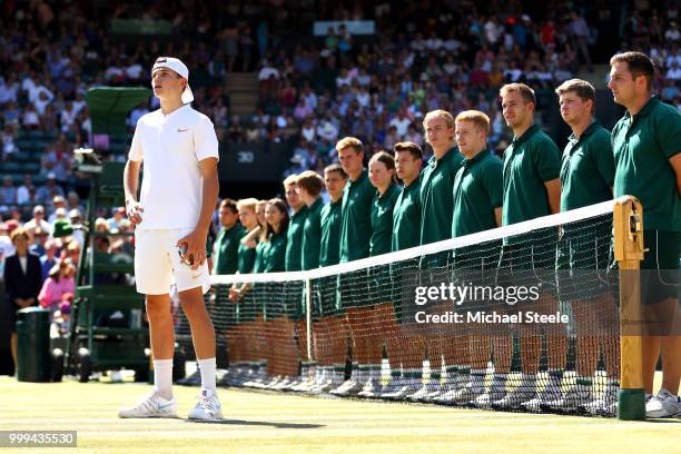 Runner-up Jack Draper of Great Britain holds his trophy after being defeated by Chun Hsin Tseng of Taiwan in the Boys' Singles final on day thirteen...