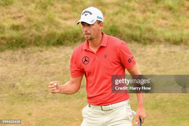 Marcel Siem of Germany reacts after his par putt on hole one during day four of the Aberdeen Standard Investments Scottish Open at Gullane Golf...