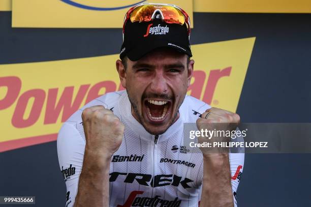 Germany's John Degenkolb celebrates on the podium after winning the ninth stage of the 105th edition of the Tour de France cycling race between Arras...