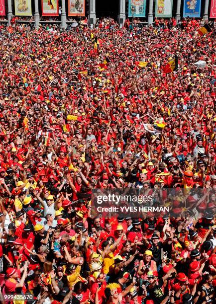 Picture shows the crowd waiting for the arrival of Belgium's Red Devil football players at the Grand Place/Grote Markt in Brussels city center, after...