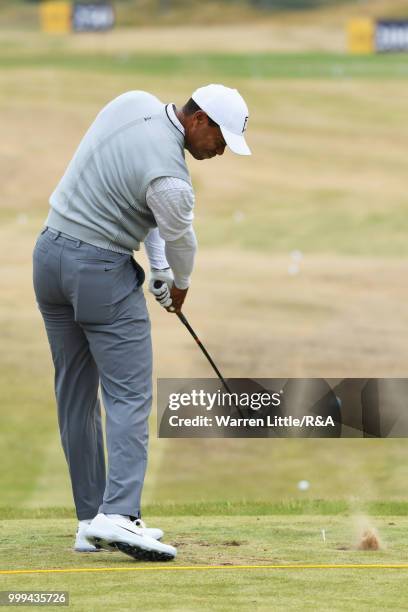 Tiger Woods of the United States practices on the driving range during previews to the 147th Open Championship at Carnoustie Golf Club on July 15,...