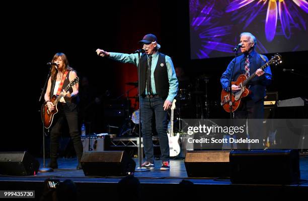 Singers Susan Cowsill, Paul Cowsill and Bob Cowsill of the classic pop-rock band The Cowsills perform onstage during the Happy Together tour at Saban...