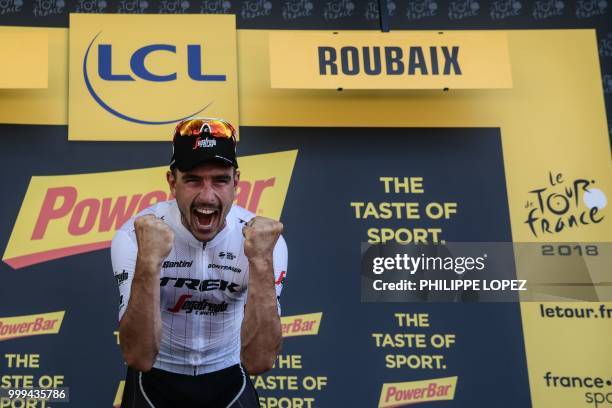 Germany's John Degenkolb celebrates on the podium after winning the ninth stage of the 105th edition of the Tour de France cycling race between Arras...