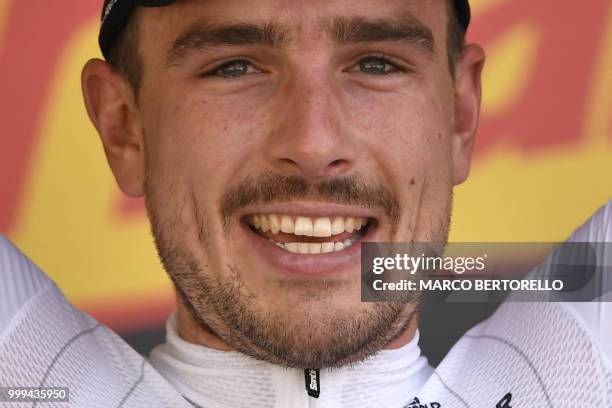 Germany's John Degenkolb celebrates on the podium after winning the ninth stage of the 105th edition of the Tour de France cycling race between Arras...