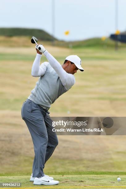 Tiger Woods of the United States practices on the driving range during previews to the 147th Open Championship at Carnoustie Golf Club on July 15,...