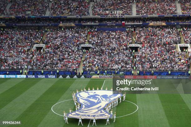 General view inside the stadium as an image of the World Cup Trophy is seen on the pitch prior to the 2018 FIFA World Cup Final between France and...