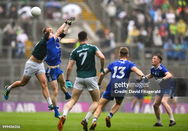 Dublin , Ireland - 15 July 2018; Karl OConnell of Monaghan competes for the ball in the air against Tommy Moolick of Kildare as Kevin Flynn of...