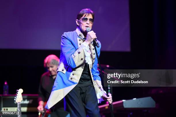 Singer Mark Lindsay, former singer of the classic garage rock band Paul Revere and the Raiders, performs onstage during the Happy Together tour at...
