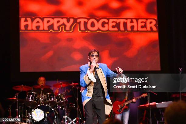 Singer Mark Lindsay, former singer of the classic garage rock band Paul Revere and the Raiders, performs onstage during the Happy Together tour at...