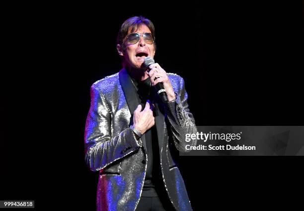 Singer Mark Lindsay, former singer of the classic garage rock band Paul Revere and the Raiders, performs onstage during the Happy Together tour at...