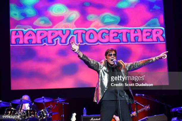 Singer Mark Lindsay, former singer of the classic garage rock band Paul Revere and the Raiders, performs onstage during the Happy Together tour at...