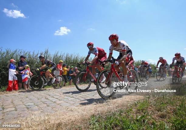 Koen de Kort of Holland and Trek  Segafredo in action amongst the peloton during the cobblestones sector between Tilloy and Sars-et-Rosieres on...