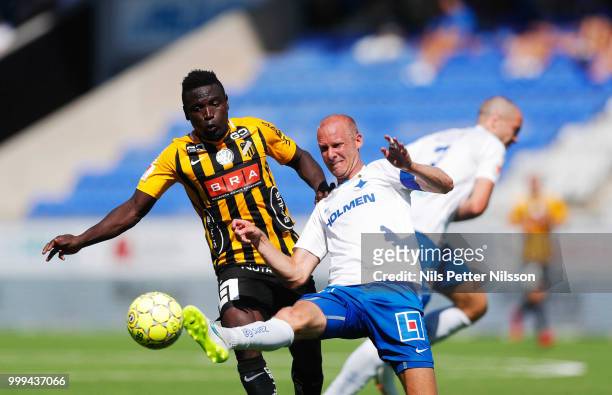 Alhassan Kamara of BK Hacken and Andreas Johansson of IFK Norrkoping competes for the ball during the Allsvenskan match between IFK Norrkoping and BK...