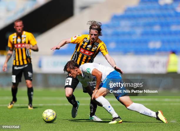 Erik Friberg of BK Hacken and Simon Thern of IFK Norrkoping during the Allsvenskan match between IFK Norrkoping and BK Hacken at Ostgotaporten on...