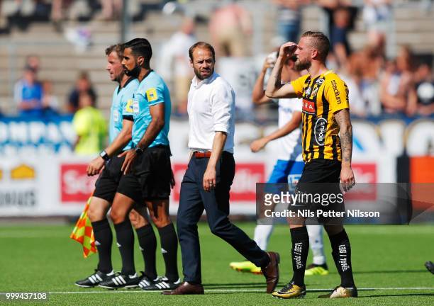 Andreas Alm, head coach of BK Hacken and Alexander Faltsetas of BK Hacken leaves the pitch after the Allsvenskan match between IFK Norrkoping and BK...