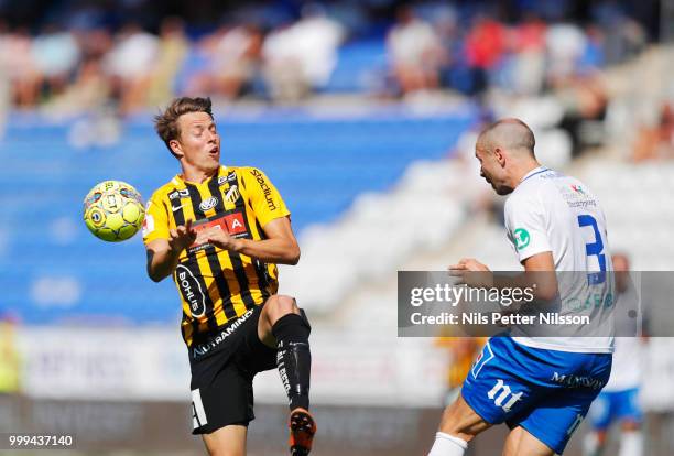 Viktor Lundberg of BK Hacken and Jon Gudni Fjoluson of IFK Norrkoping during the Allsvenskan match between IFK Norrkoping and BK Hacken at...