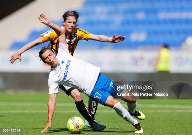 Erik Friberg of BK Hacken and Simon Thern of IFK Norrkoping competes for the ball during the Allsvenskan match between IFK Norrkoping and BK Hacken...