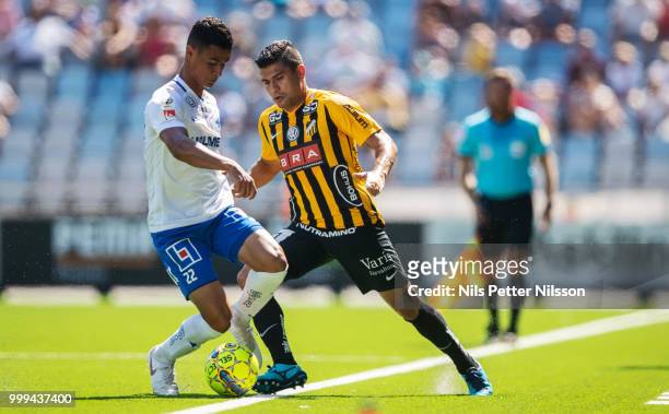 Ian Smith of IFK Norrkoping and Paulinho of BK Hacken competes for the ball during the Allsvenskan match between IFK Norrkoping and BK Hacken at...
