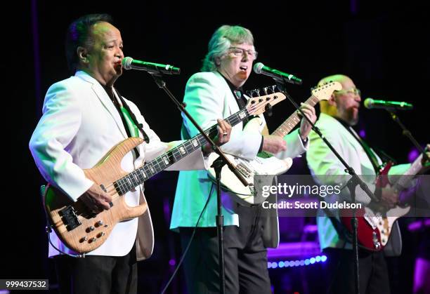 Singers Del Ramos, Jim Yester and Jules Alexander of the classic rock band The Association perform onstage during the Happy Together tour at Saban...