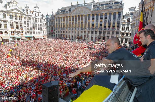 Belgium's head coach Roberto Martinez celebrates at the balcony in front thousands of supporters at the Grand-Place, Grote Markt in Brussels city...