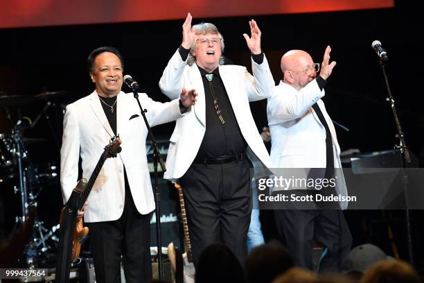 Singers Del Ramos, Jim Yester and Jules Alexander of the classic rock band The Association perform onstage during the Happy Together tour at Saban...