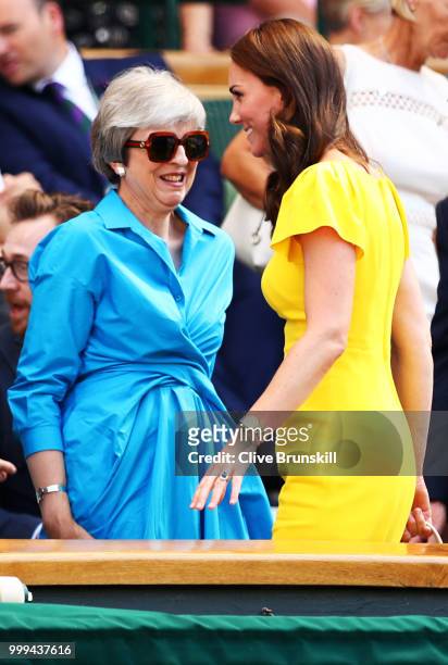 Catherine, Duchess of Cambridge with British Prime Minister Theresa May as they attend the Men's Singles final attend the Men's Singles final on day...