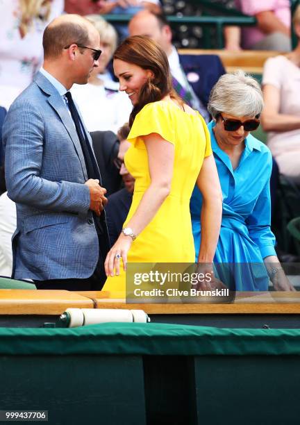 Catherine, Duchess of Cambridge and Prince William, Duke of Cambridge with British Prime Minister Theresa May as they attend the Men's Singles final...