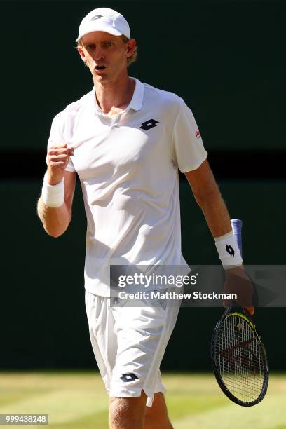 Kevin Anderson of South Africa celebrates a point against Novak Djokovic of Serbia during the Men's Singles final on day thirteen of the Wimbledon...