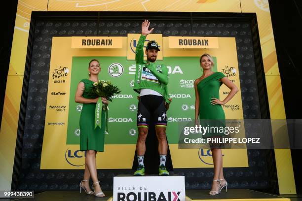 Slovakia's Peter Sagan, wearing the best sprinter's green jersey, celebrates on the podium after the ninth stage of the 105th edition of the Tour de...