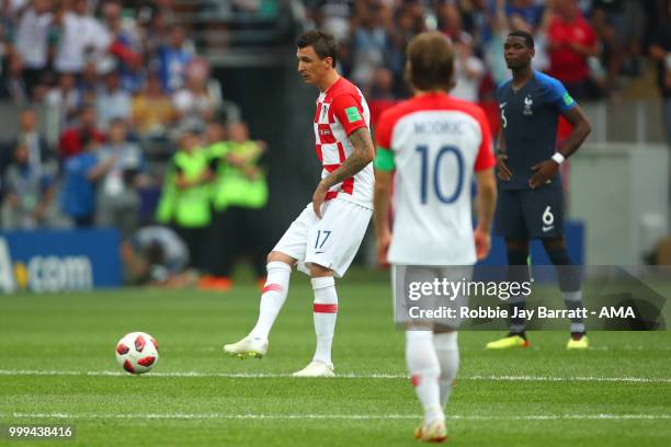 Mario Mandzukic of Croatia kicks off the match during the 2018 FIFA World Cup Russia Final between France and Croatia at Luzhniki Stadium on July 15,...