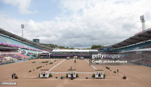 German dressage rider Dorothee Schneider and horse Sammy Davis in action during the freestyle dressage grand prix of the FEI European Championships...