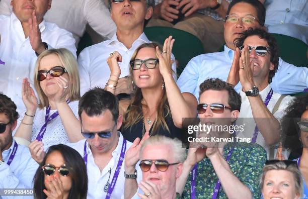 Kate Winslet and Ned Rocknroll react during the men's singles final on day thirteen of the Wimbledon Tennis Championships at the All England Lawn...