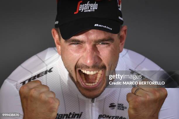 Germany's John Degenkolb celebrates on the podium after winning the ninth stage of the 105th edition of the Tour de France cycling race between Arras...