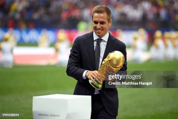 Former German International Footballer, Philipp Lahm presents the 2018 FIFA World Cup Original Trophy ahead of the 2018 FIFA World Cup Final between...