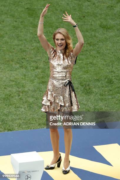 Russian model Natalia Vodianova reacts during the closing ceremony prior to the Russia 2018 World Cup final football match between France and Croatia...