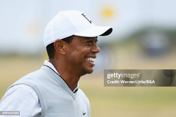 Tiger Woods of the United States practices on the driving range during previews to the 147th Open Championship at Carnoustie Golf Club on July 15,...