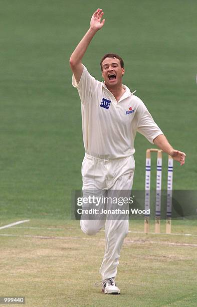 Stuart Clark of New South Wales in action during the second day of play in the Pura Cup Match between the Queensland Bulls and the New South Wales...