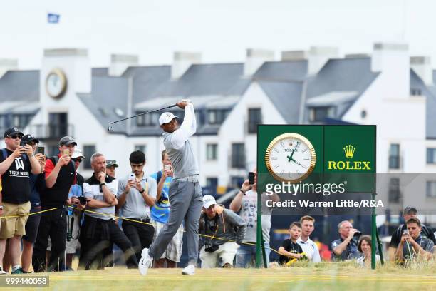 Tiger Woods of the United States tees off on the 2nd hole while practicing during previews to the 147th Open Championship at Carnoustie Golf Club on...
