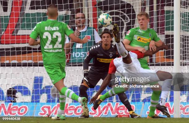 Augsburg's Sergio Cordova in action in front of Gladbach's Yann Sommer during the Bundesliga soccer match between FC Augsburg and Borussia...