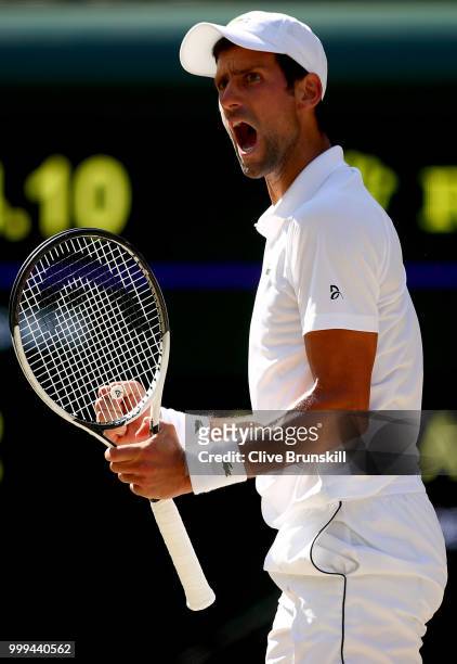 Novak Djokovic of Serbia celebrates a point against Kevin Anderson of South Africa during the Men's Singles final on day thirteen of the Wimbledon...