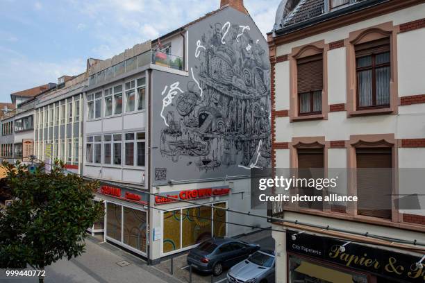 An exterior wall of a residential building on which the German street artist Cone the Weird has done a piece of art work in Saabruecken, Germany, 25...